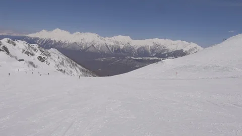 Pe view from the eyes while skiing on the ski slooverlooking the landscape Stock Footage 127590018