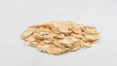 Pea flakes on white background. Grits for Breakfast. Видео 129850719
