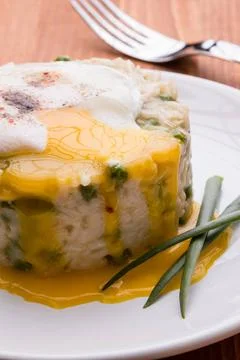 Pea risotto with egg fresh vegetarian pea risotto with poached egg Copyrig... Stock Photos