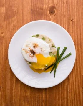 Pea risotto with egg Stock Photos