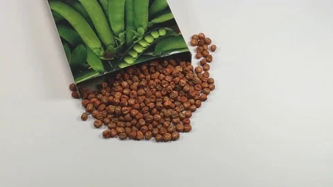 Pea seeds for sowing with packaging Stock Footage 105026648