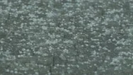 Pea Sized Hail Falling Onto Roof Without Damage Stock Footage