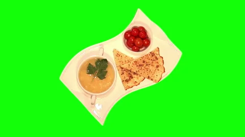 Pea soup, cherry tomatoes, spicy flat cake on tray Stock Footage 46462053