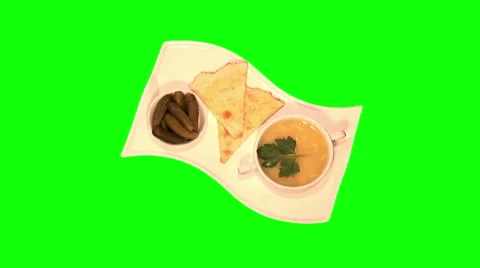 Pea soup, marinated cornichons, flat cake on tray Stock Footage 46462157