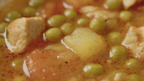 Pea stew with poultry close-up 4K sliding footage Video stock 172252653
