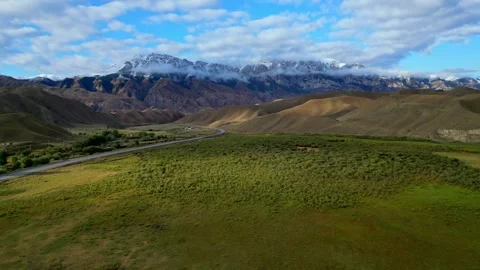 Peace and space, winding roads and distant mountains in the soft sunlight Stock-Footage 338360413