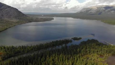 Peace and tranquility. Unity with nature. Beautiful mountain lake. Stock Footage 225909588