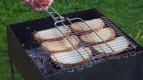 A peace of delicious bread is grilled Stock Footage 106479845