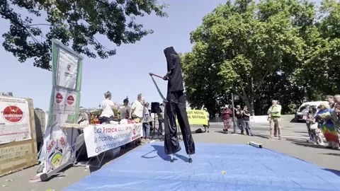 Peace groups protest in Paris against nuclear weapons on the 80th anniversary of Stock Footage 314397381