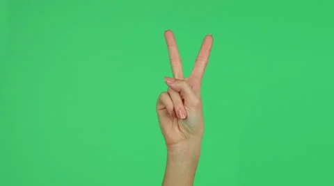 Peace hand gesture on green screen background 4K Stock-Footage 46363649