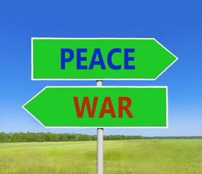 Peace instead war symbol. Concept words Peace and War on beautiful green ro.. Foto stock