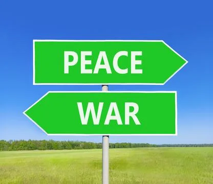 Peace instead war symbol. Concept words Peace and War on beautiful green ro.. Foto stock