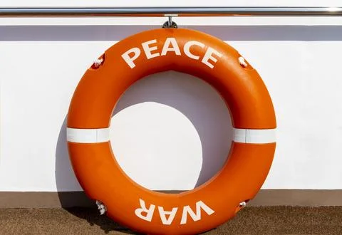 Peace instead war symbol. Concept words Peace and War on beautiful orange l.. 스톡 사진