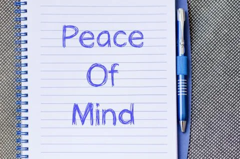 Peace of mind write on notebook Stock Photos