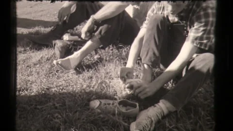 Peace Protestors Walk for Peace - Take Off Shoes in the Grass Stock Footage 130717341