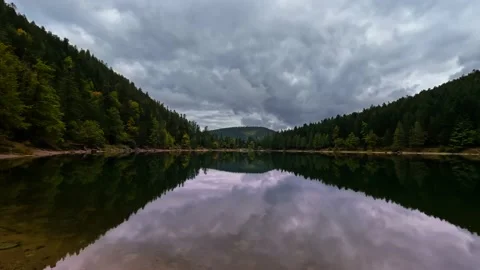 Peaceful Alpine Lake Stock Footage 220475385