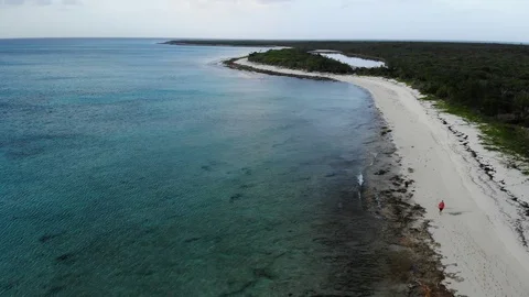 Peaceful Backwards Drone Shot, Malcolm Beach, Turks and Caicos, 4K Stock Footage 120186078