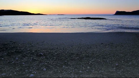 Peaceful beach at dawn, seamless loop Stock-Footage 49934388