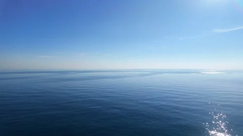 Peaceful Blue Sea Surface Panning Wide Shot 스톡 동영상 339461973