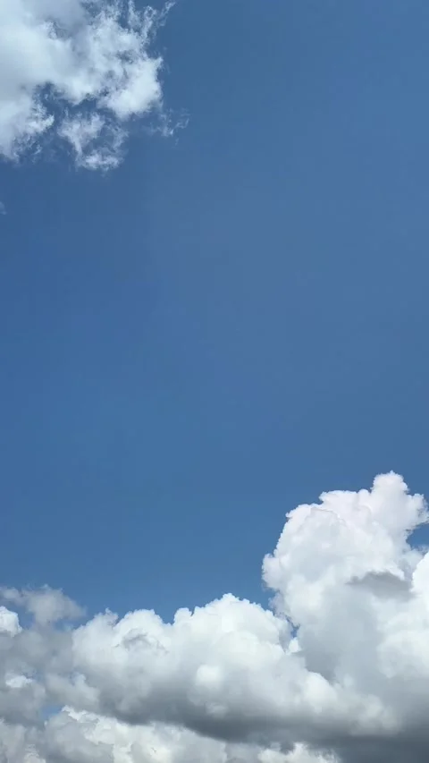 Peaceful Blue Sky and Floating White Clouds – Nature Background Footage Stock Footage 336975582
