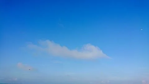 Peaceful Blue Sky with Clouds. Stock Photos