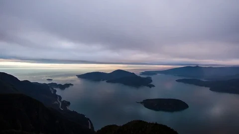 Peaceful Dawn Clouds Over Islands and Ocean Stock Footage 73309896