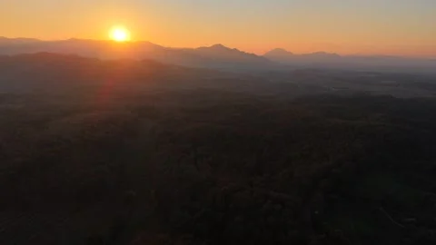 Peaceful Evening Light Over Forested Hills Stock Footage 326176702