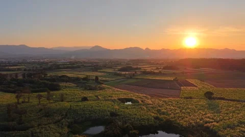 Peaceful Evening Sunset Behind Mountain Silhouette Stock Footage 325686708