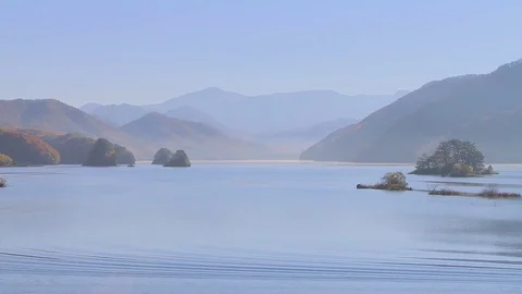 Peaceful lake in the countryside, Japan Stock Footage
