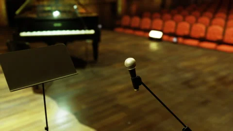 Peaceful moment capturing equipment and empty seats before music starts Stock Footage 340342147