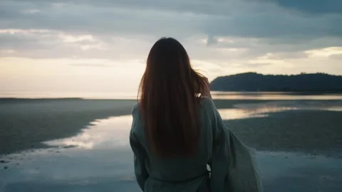 Peaceful moment of creative focus. Young woman photographer taking pictures of Stock Footage 311293910