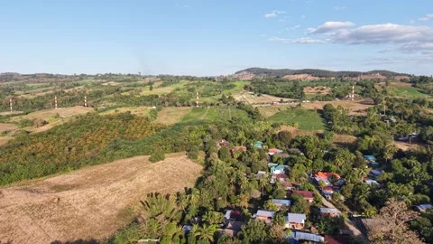 Peaceful Mountain Landscape with Green Fields Stock Footage 325686689