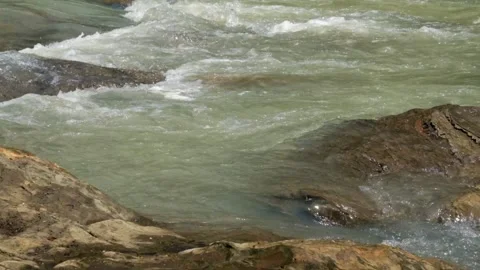 A peaceful mountain riverbank 스톡 동영상 336877817