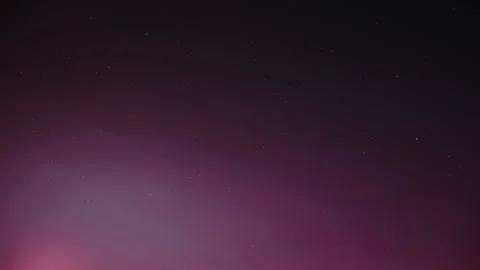 Peaceful night sky background featuring a soft purple gradient fading into blac Stock Footage 341168705