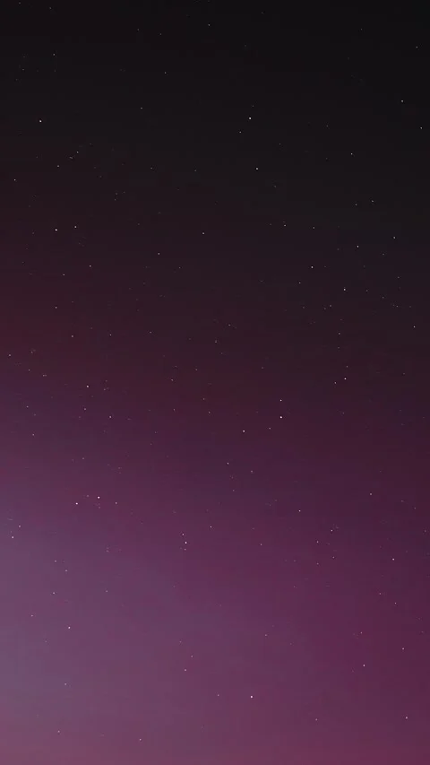 Peaceful night sky background featuring a soft purple gradient fading into Stock Footage 341367752