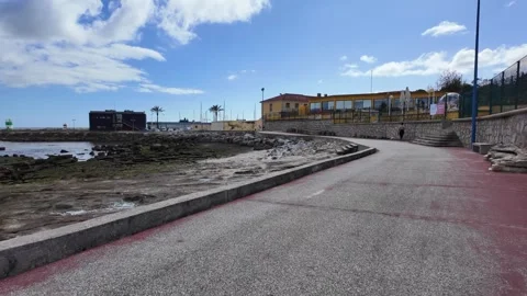 Peaceful ocean view walk on promenade in Europe Stock Footage 307642995