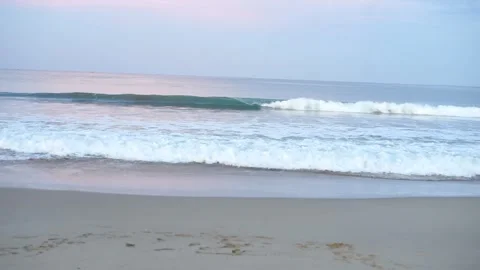 Peaceful Ocean Waves Gently Break on Sandy Beach Shoreline Stock Footage 334225717