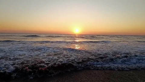 Peaceful Ocean Waves at Sunset in 4K Stock Footage 308822726