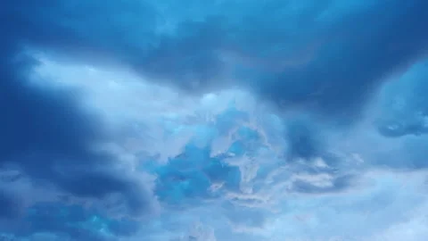 Peaceful pastel blue sky clouds seamless ambient background loop Stock Footage 345616196