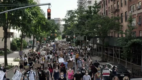 Peaceful protestors marching up 5th NYC George Floyd protest Black Lives Matter Stock Footage 132384156