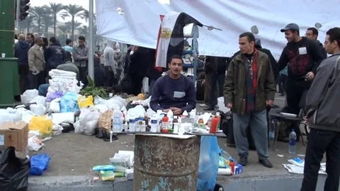 Peaceful protests light up Tahrir Square Stock Footage 114760897