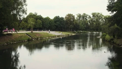 Peaceful river "Lippe" through the central city park during summer day Lippstadt Stock Footage 112829745