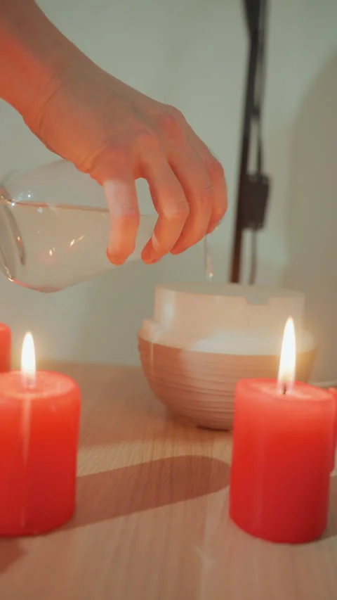Peaceful setting featuring softly flickering candle flames. Soothing spa Stock Footage 329885473