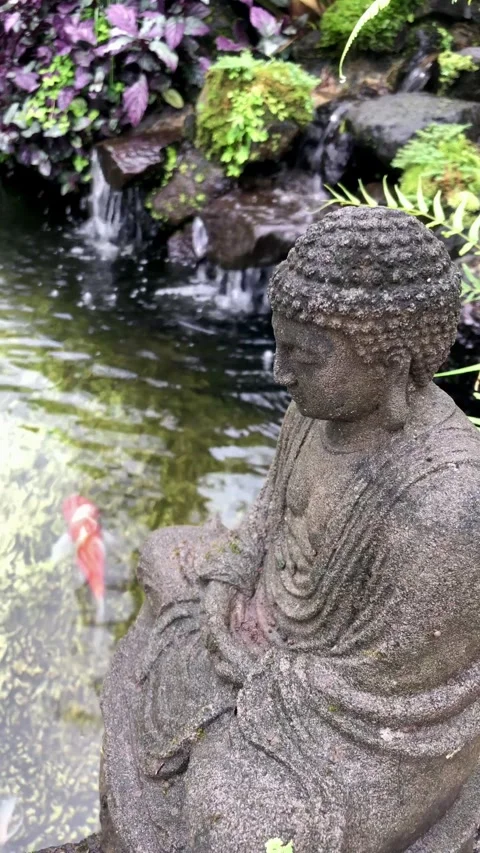 Peaceful side view of stone Buddha statue  動画素材 333694617