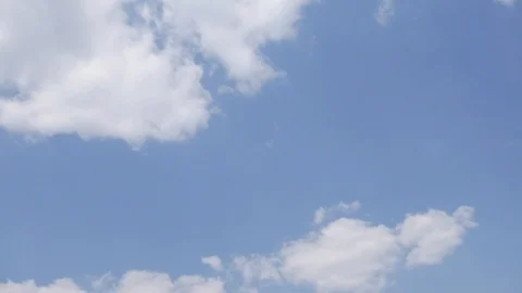 Peaceful sky with white clouds and sunshine Stock Footage 107228864