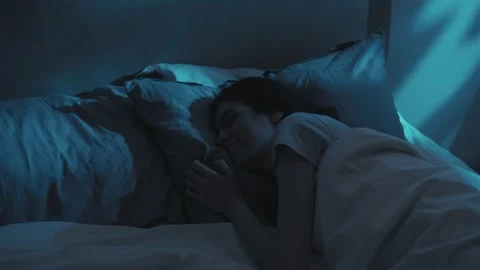 Peaceful sleep calm night woman snoozing soft bed Stock Footage