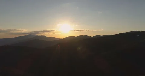 Peaceful sunset landscape over dark mountains in the spring Stock Footage 129225162