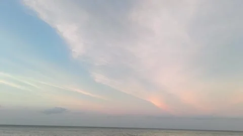 Peaceful Sunset Over Calm Ocean with Pastel Clouds and Soft Horizon 스톡 동영상 341505924