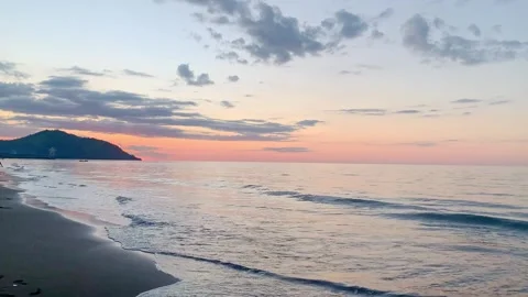 Peaceful Sunset on a Sandy Beach Stock Footage 295447689