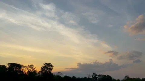 Peaceful Sunset with Soft Clouds &amp; Vibrant Colors, Ideal for Nature Designs Stock Footage 288653193